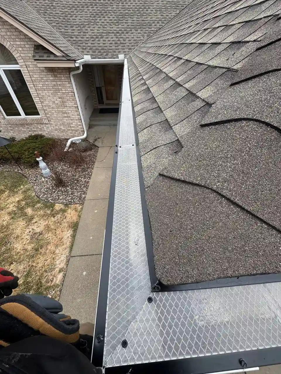 Micro-mesh gutter guard installation aerial view in Woodbury MN